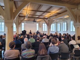 Symposium "Social Justice and Technological Futures"