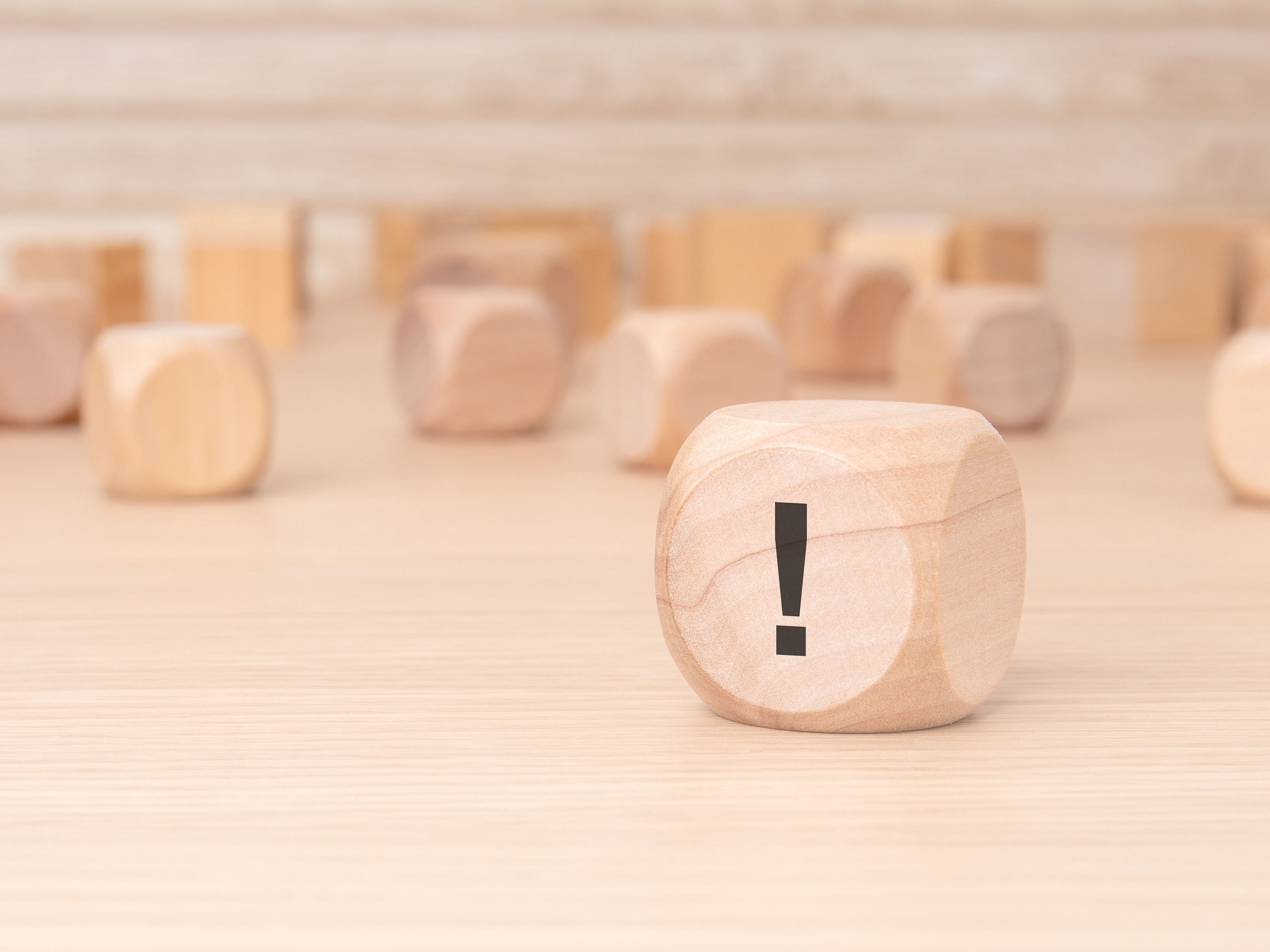 Tile image showing a cube with an exclamation mark in front of neutral wooden cubes (link to "Awareness")
